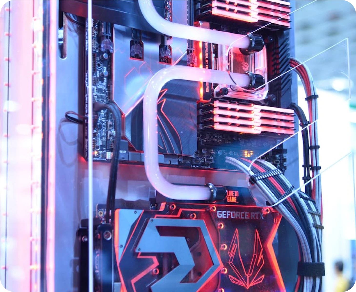 A close up of a computer case with neon lights.